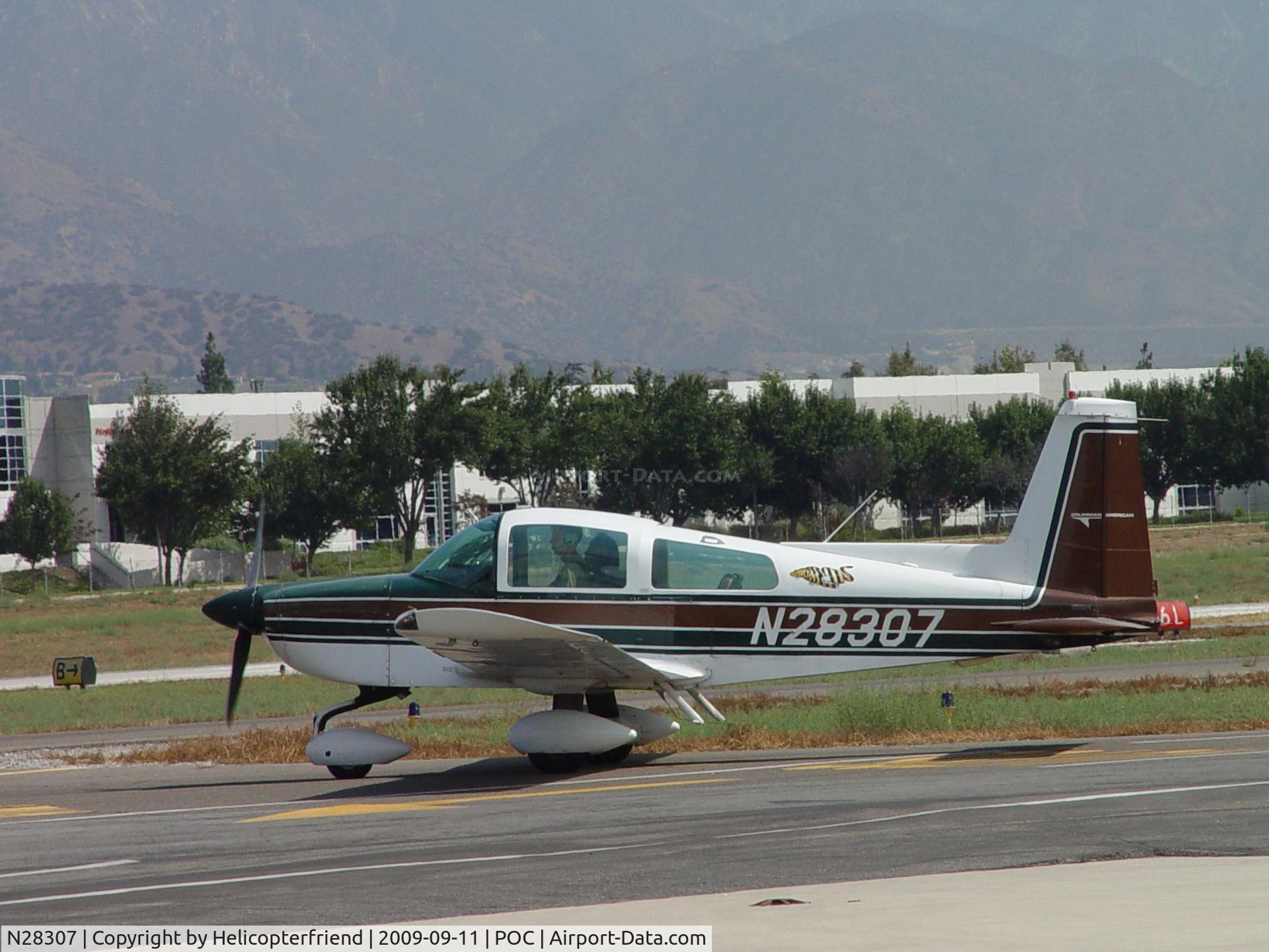 N28307, 1977 Grumman American AA-5B Tiger C/N AA5B0551, Taxiing to 26L for take off at Brackett