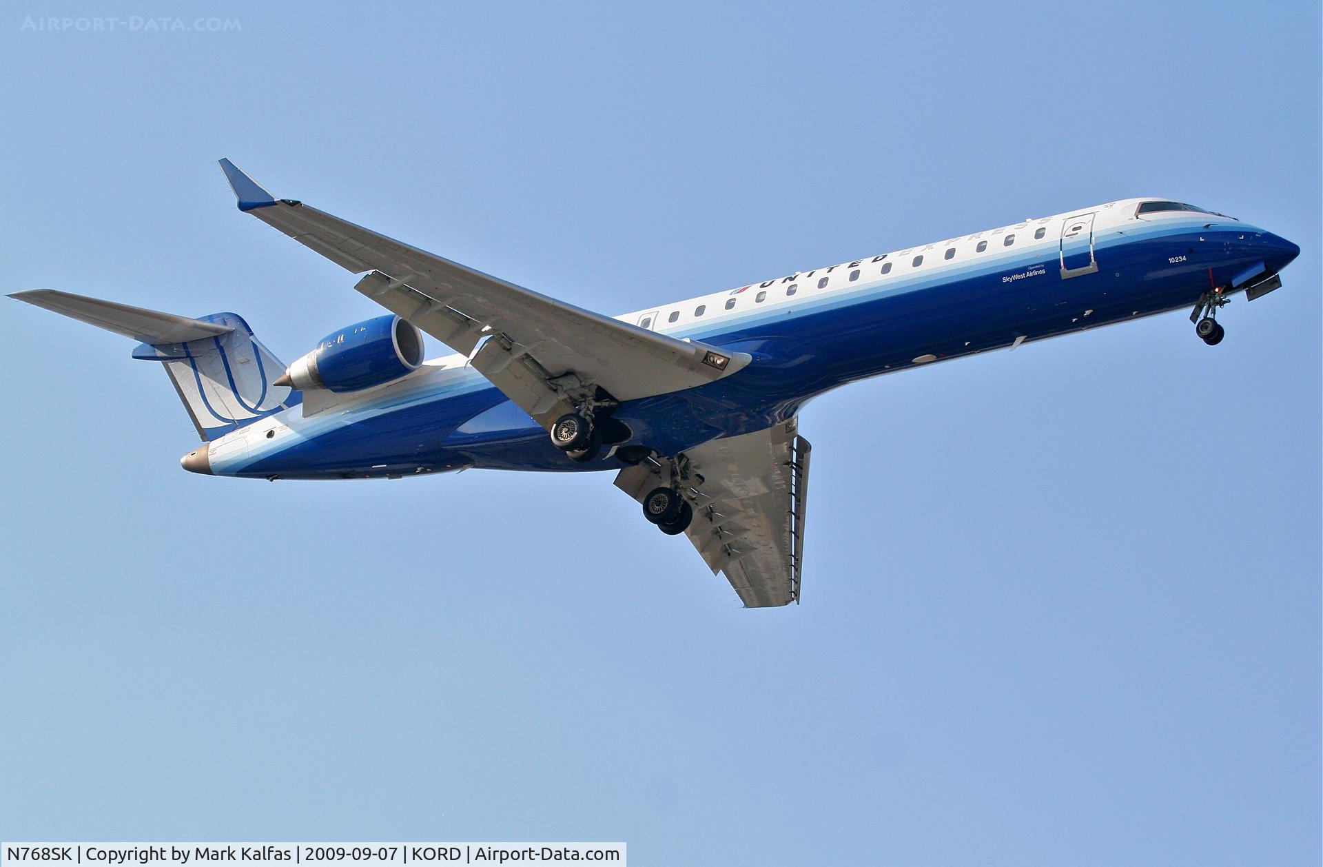 N768SK, 2005 Bombardier CRJ-701ER (CL-600-2C10) Regional Jet C/N 10234, Sky West/United Express CL-600-2C10, N768SK short final RWY 10 KORD