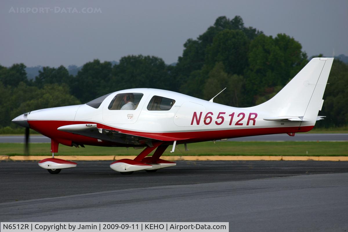 N6512R, 2003 Lancair LC42-550FG C/N 42014, Taxiing to park after an early morning arrival.
