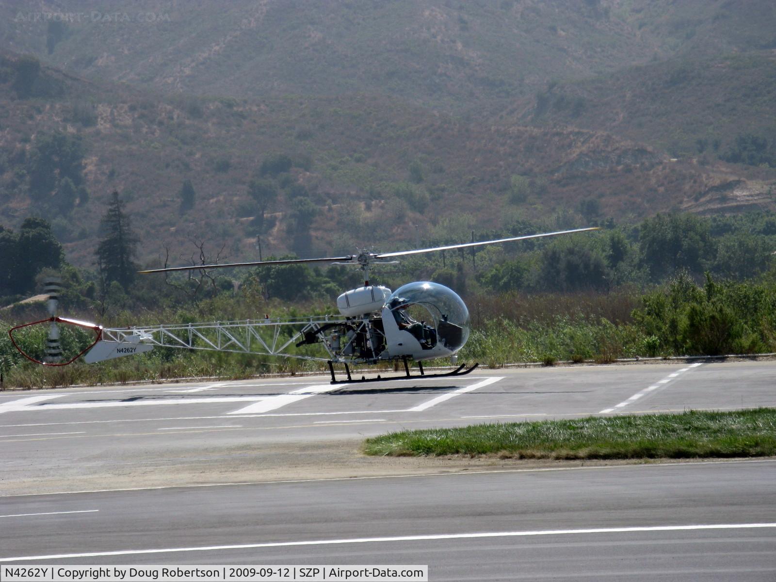 N4262Y, 1965 Bell 47G-4A C/N 7674, 1965 Bell 47G-4A, Lycoming VO-540 305 Hp. The Bell 47 was the world's first practical mass-produced helicopter offering reliabilty in a simple airframe. Nearly landed.