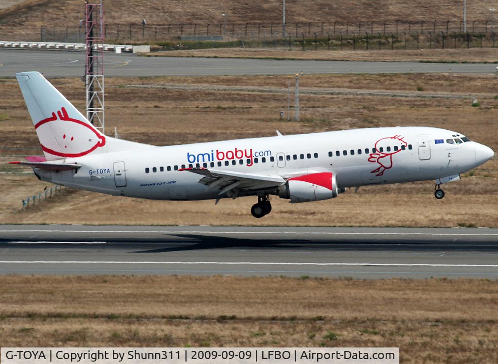 G-TOYA, 1994 Boeing 737-3Q8 C/N 26310, Landing rwy 14R