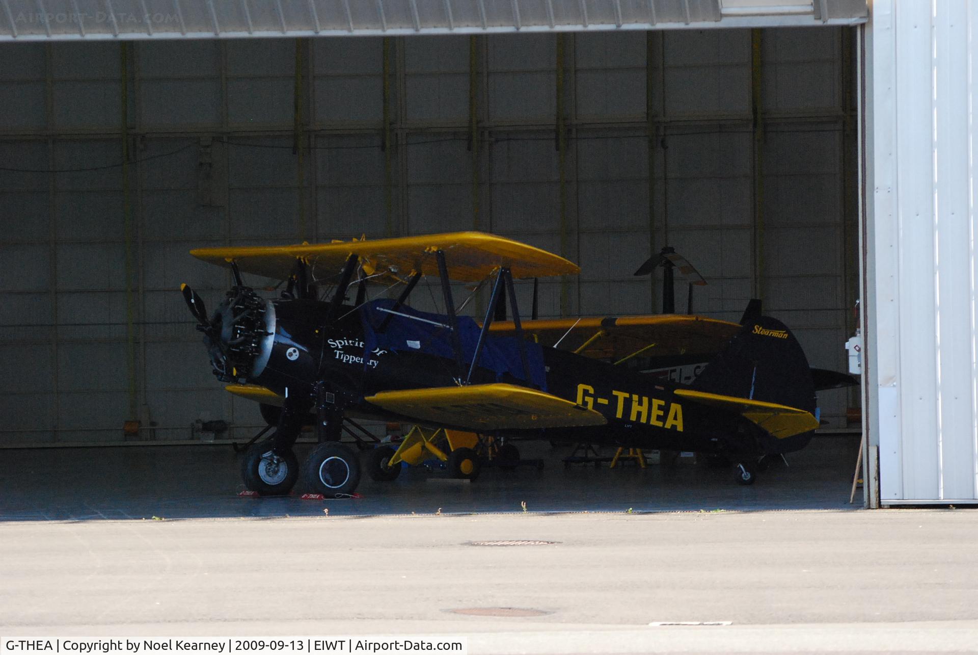 G-THEA, 1944 Boeing A75N1 C/N 75-5736A, Beautiful Boeing Stearman, hiding in the hanger.