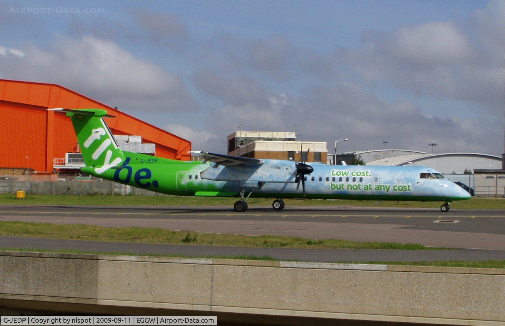 G-JEDP, 2003 De Havilland Canada DHC-8-402Q Dash 8 C/N 4085, In nice special colours.