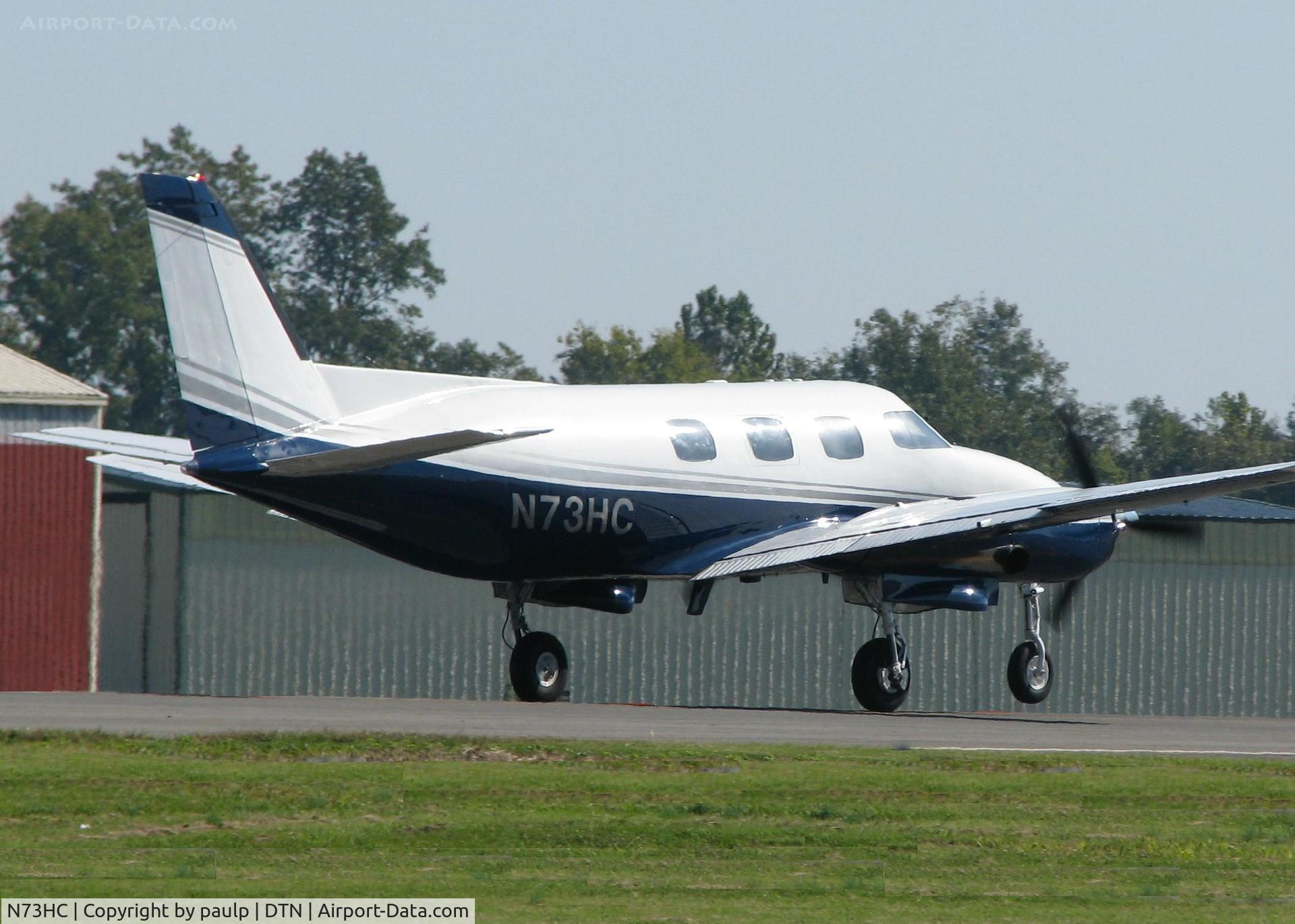 N73HC, 1969 Swearingen SA-26AT Merlin IIB C/N T26-138, Nose gear about to touch down on runway 14 at the Shreveport Downtown airport.