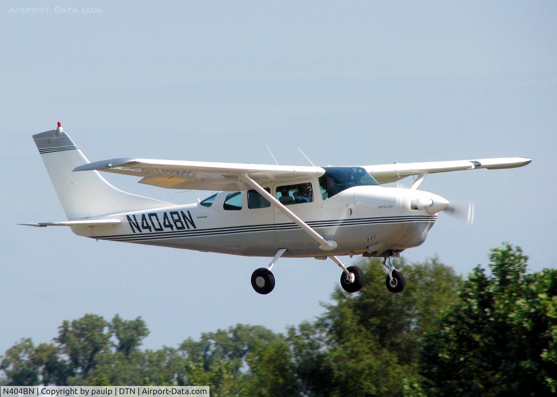 N404BN, 1965 Cessna 210E Centurion C/N 21058705, Landing on runway 14 at the Shreveport Downtown airport.