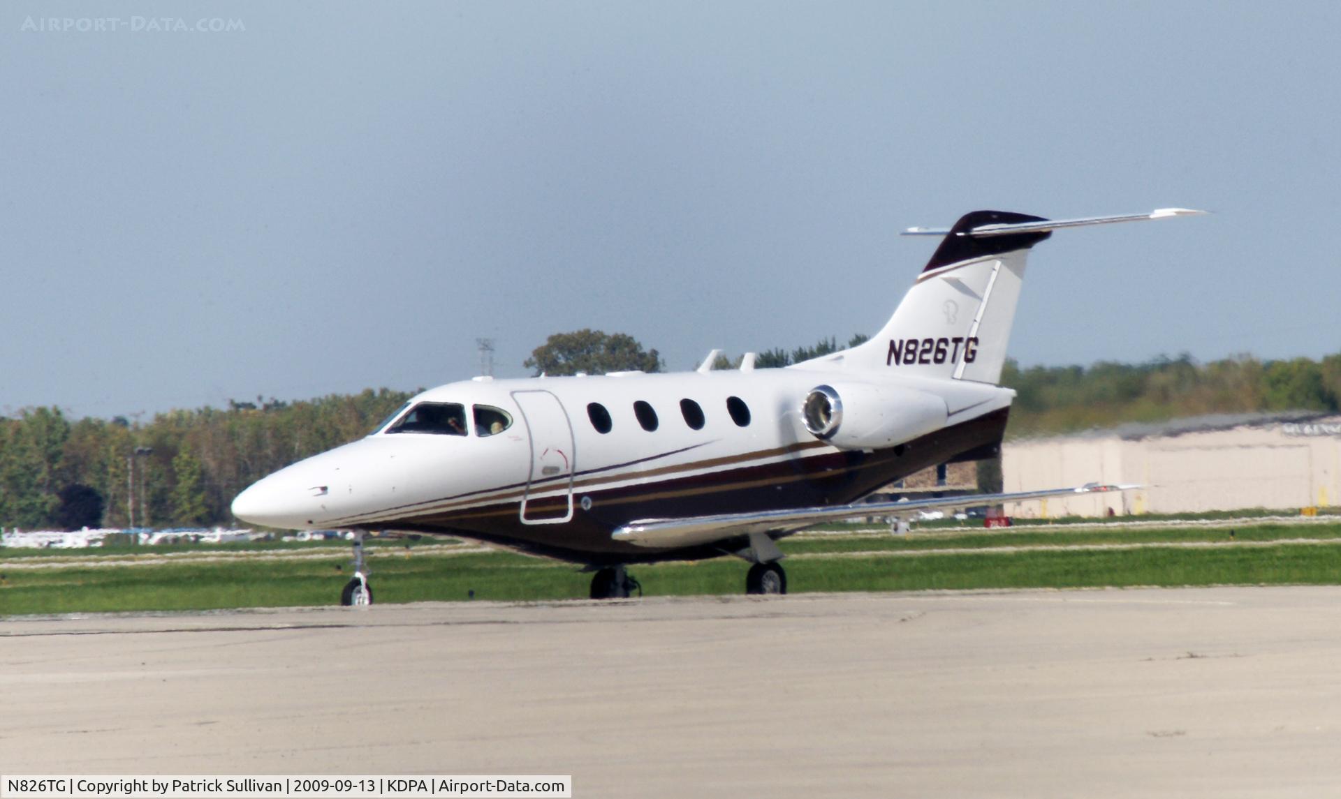 N826TG, 2009 Hawker Beechcraft Corp 390 C/N RB-258, taxi to take off, DuPage Airport