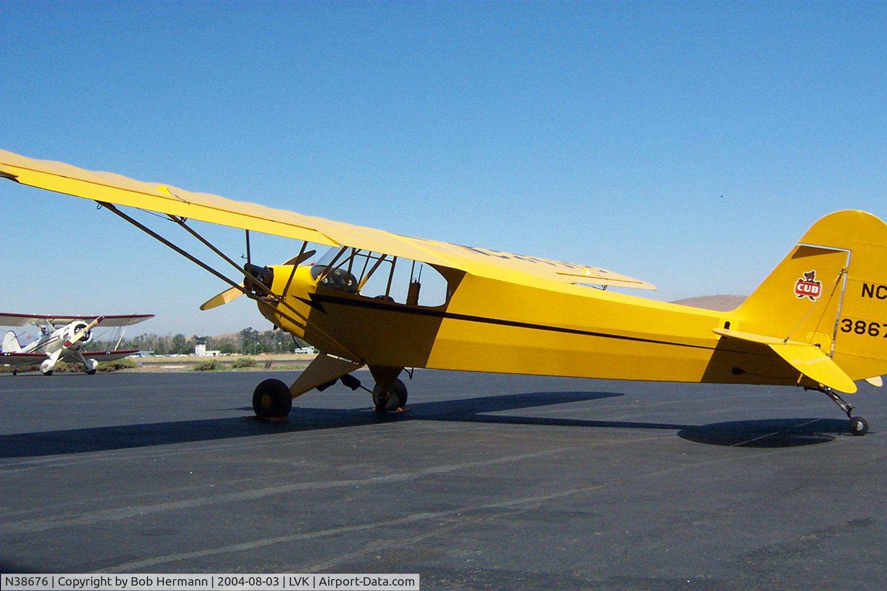 N38676, 1941 Piper J3C-65 Cub C/N 7185, Cub on the ramp at Attitude Aviation, Livermore,CA.