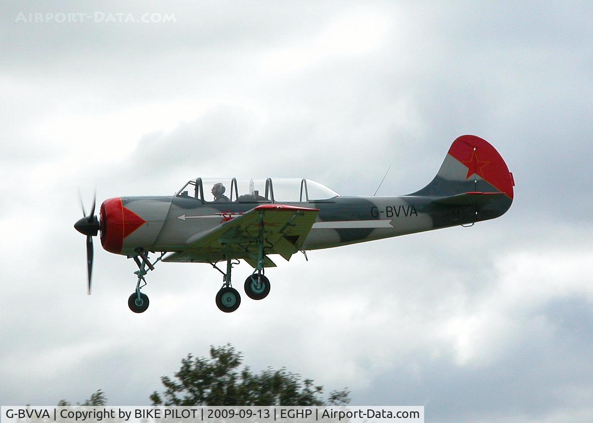 G-BVVA, 1987 Bacau Yak-52 C/N 877610, TEAM OSPREY YAK-52 LANDING RWY 03. PREV. REG. LY-ANN. POPHAM RUSSIAN AIRCRAFT FLY-IN
