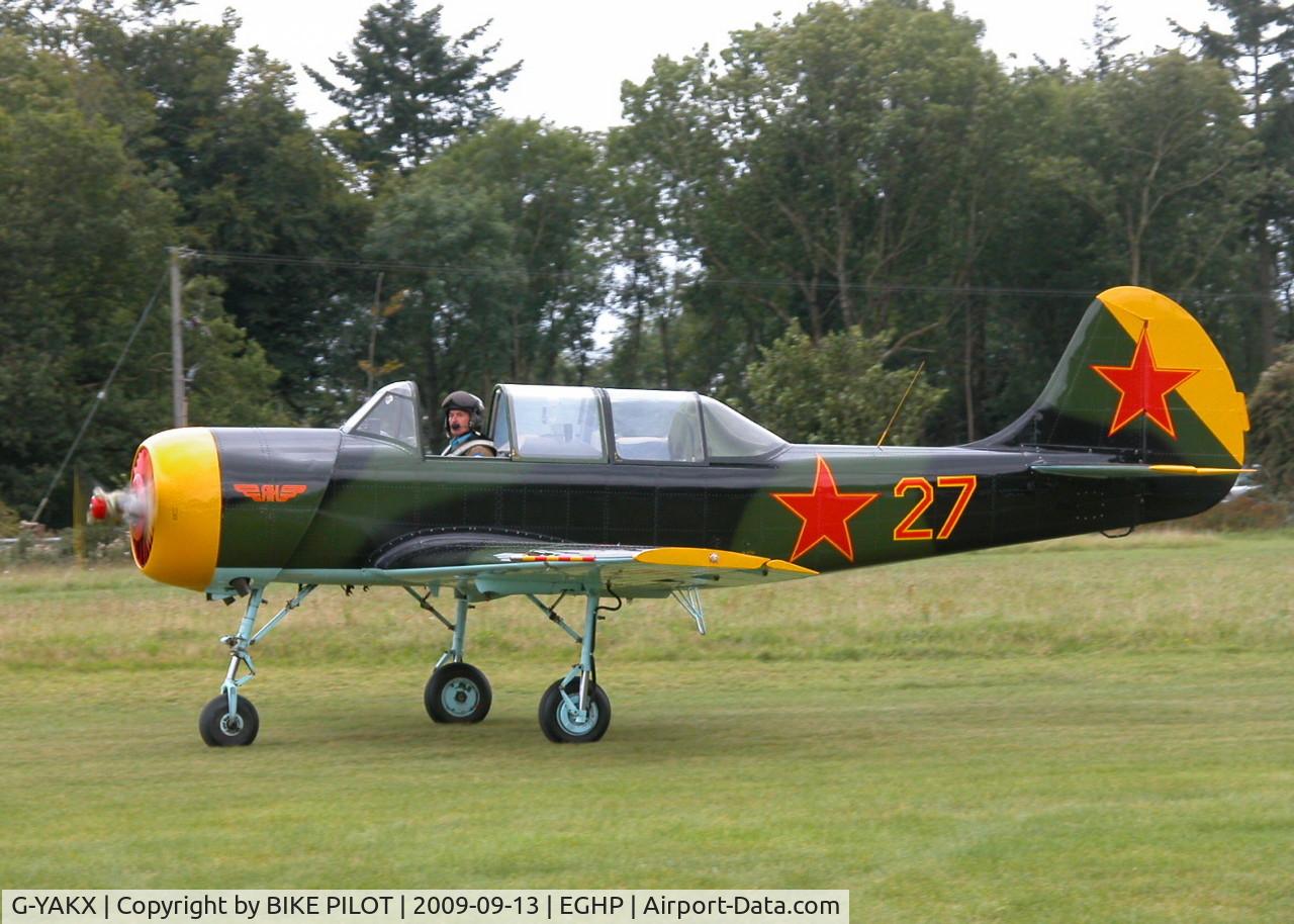 G-YAKX, 1991 Yakovlev (Aerostar) Yak-52 C/N 9111307, RESIDENT YAK-52. PREV. REG. RA-44473. POPHAM RUSSIAN AIRCRAFT FLY-IN