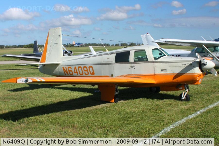 N6409Q, 1967 Mooney M20C Ranger C/N 670149, At the MERFI fly-in, Urbana, Ohio.  Note the BT-13 landing in the background.