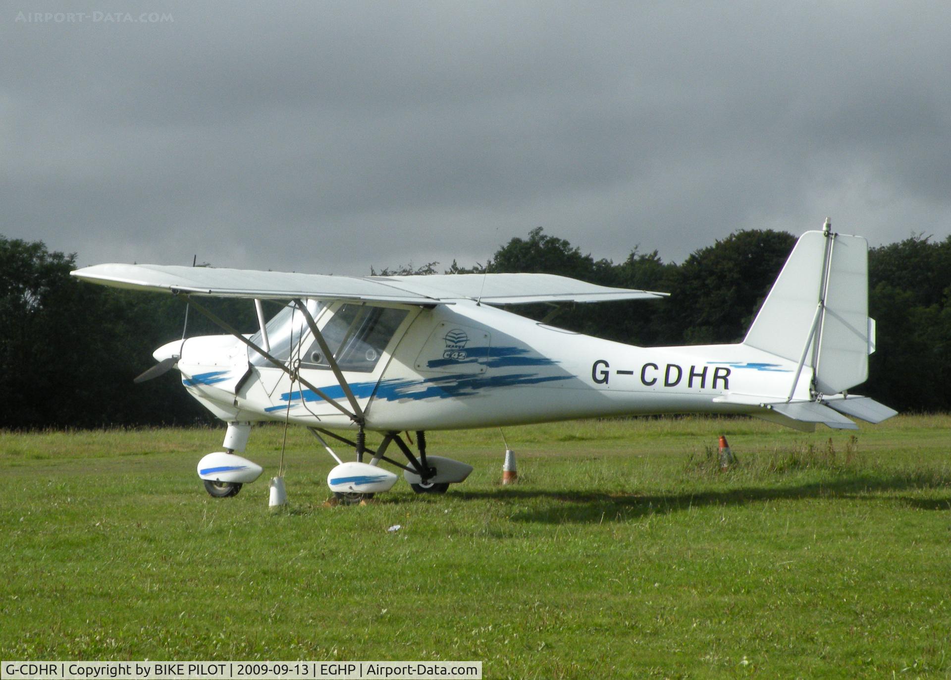 G-CDHR, 2005 Comco Ikarus C42 FB80 C/N 0502-6652, AIRBOURNE AVIATION C42 SITTING IN THE EARLY MORNING SUN. POPHAM RUSSIAN AIRCRAFT FLY-IN