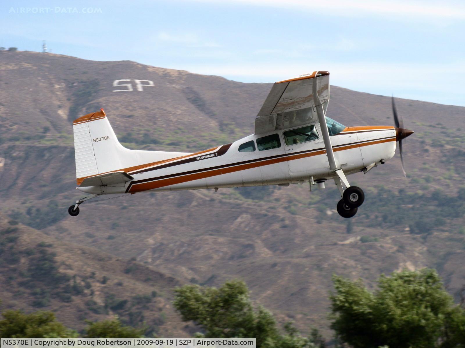 N5370E, 1980 Cessna A185F Skywagon 185 C/N 18503958, 1980 Cessna A185F SKYWAGON Eye in the Sky Camera, Continental IO-550-D 300 Hp, Experimental class, takeoff climb Rwy 22
