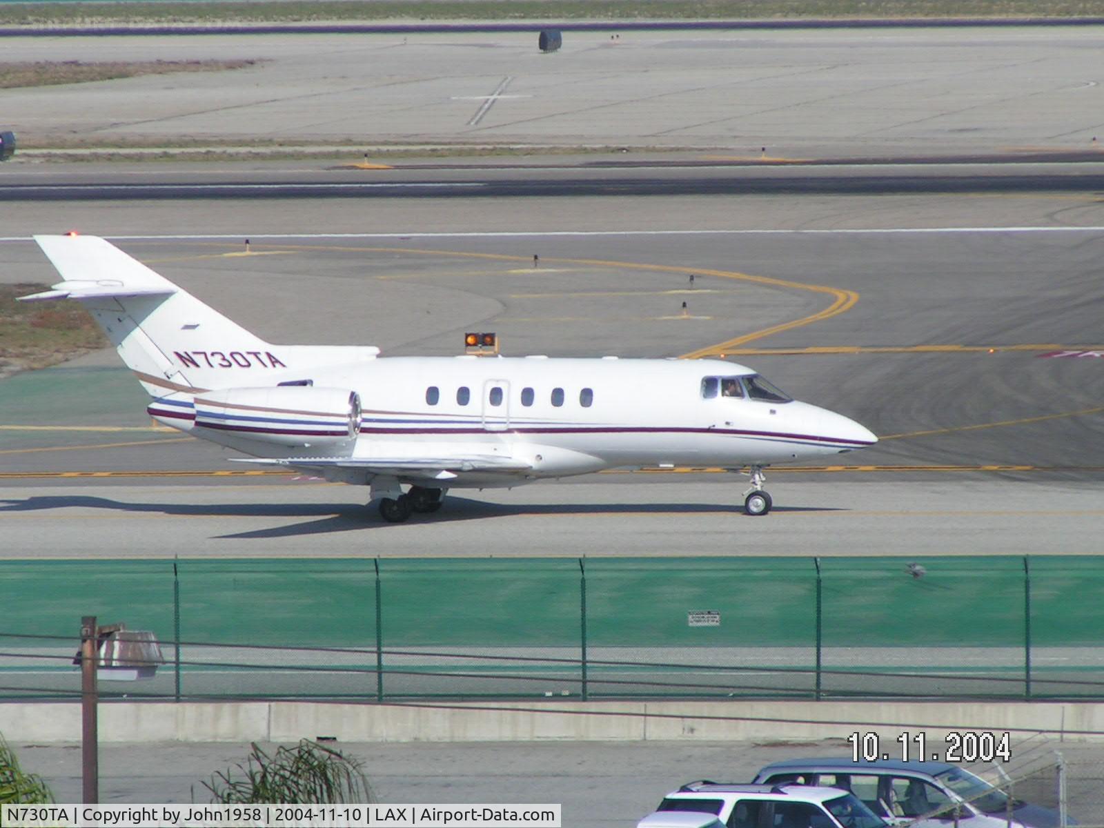 N730TA, 1998 Raytheon Hawker 800XP C/N 258383, Taxying in at LAX, southside