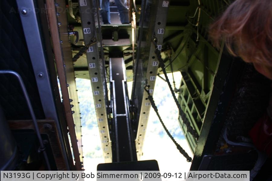N3193G, 1944 Boeing B-17G Flying Fortress C/N 77255, Looking aft from the cockpit with the bomb doors open at 2500' over western Ohio.
