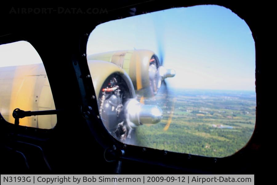 N3193G, 1944 Boeing B-17G Flying Fortress C/N 77255, View of engines 1 & 2 from Yankee Lady's navigator space over western Ohio at 2500'