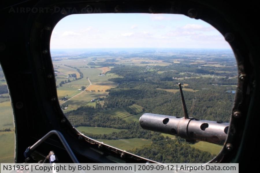 N3193G, 1944 Boeing B-17G Flying Fortress C/N 77255, View out the right side window at Yankee Lady's bombardier space over western Ohio at 2500'.