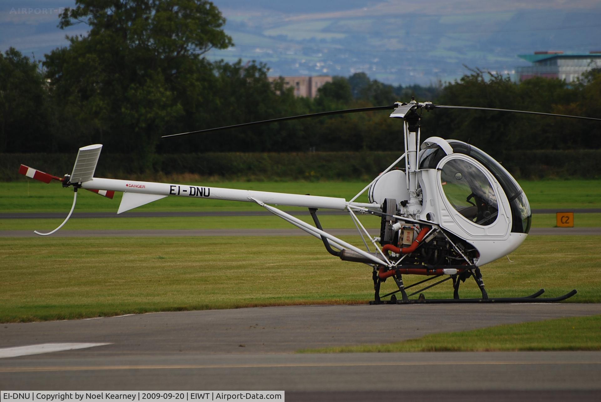 EI-DNU, Schweizer 269 C-1 C/N 0233, Parked on the apron