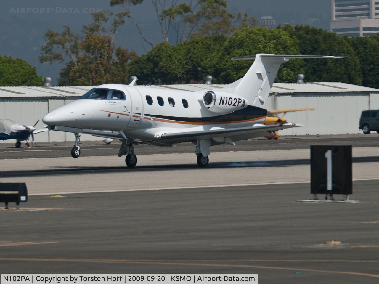 N102PA, 2009 Embraer EMB-500 Phenom 100 C/N 50000030, N102PA arriving on RWY 21