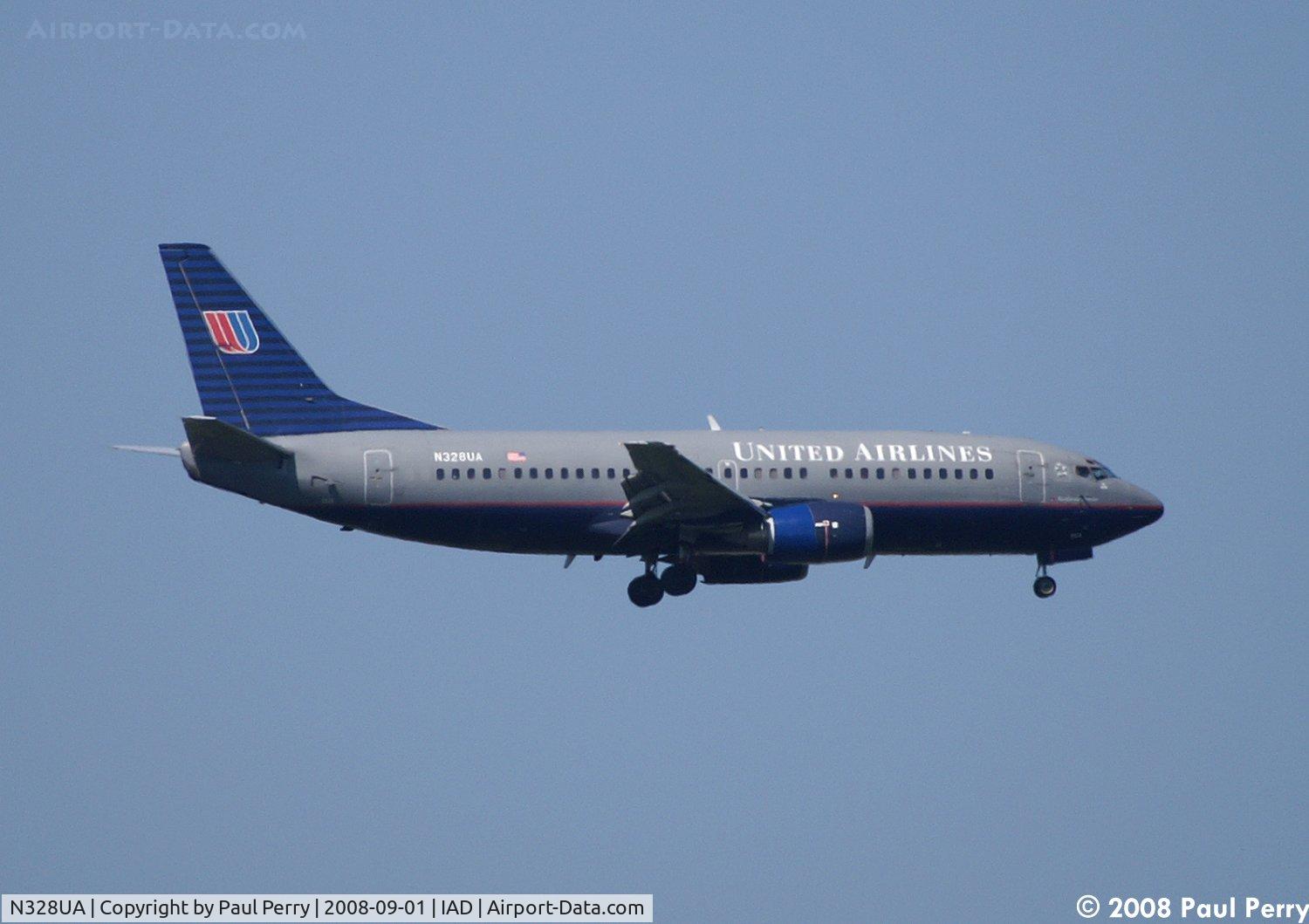 N328UA, 1988 Boeing 737-322 C/N 24148, Darker livery on her