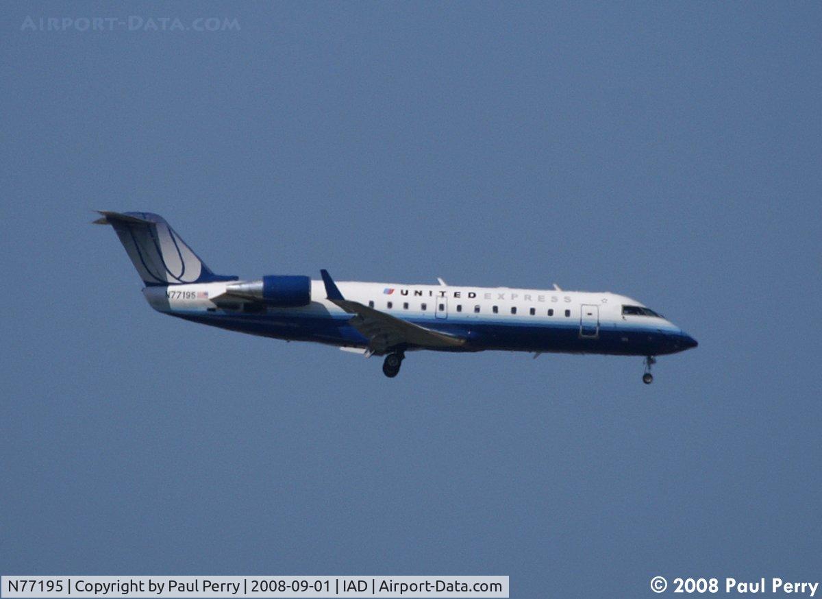 N77195, 1997 Canadair CRJ-200LR (CL-600-2B19) C/N 7195, Yet another arrival.  All day busy at Dulles!