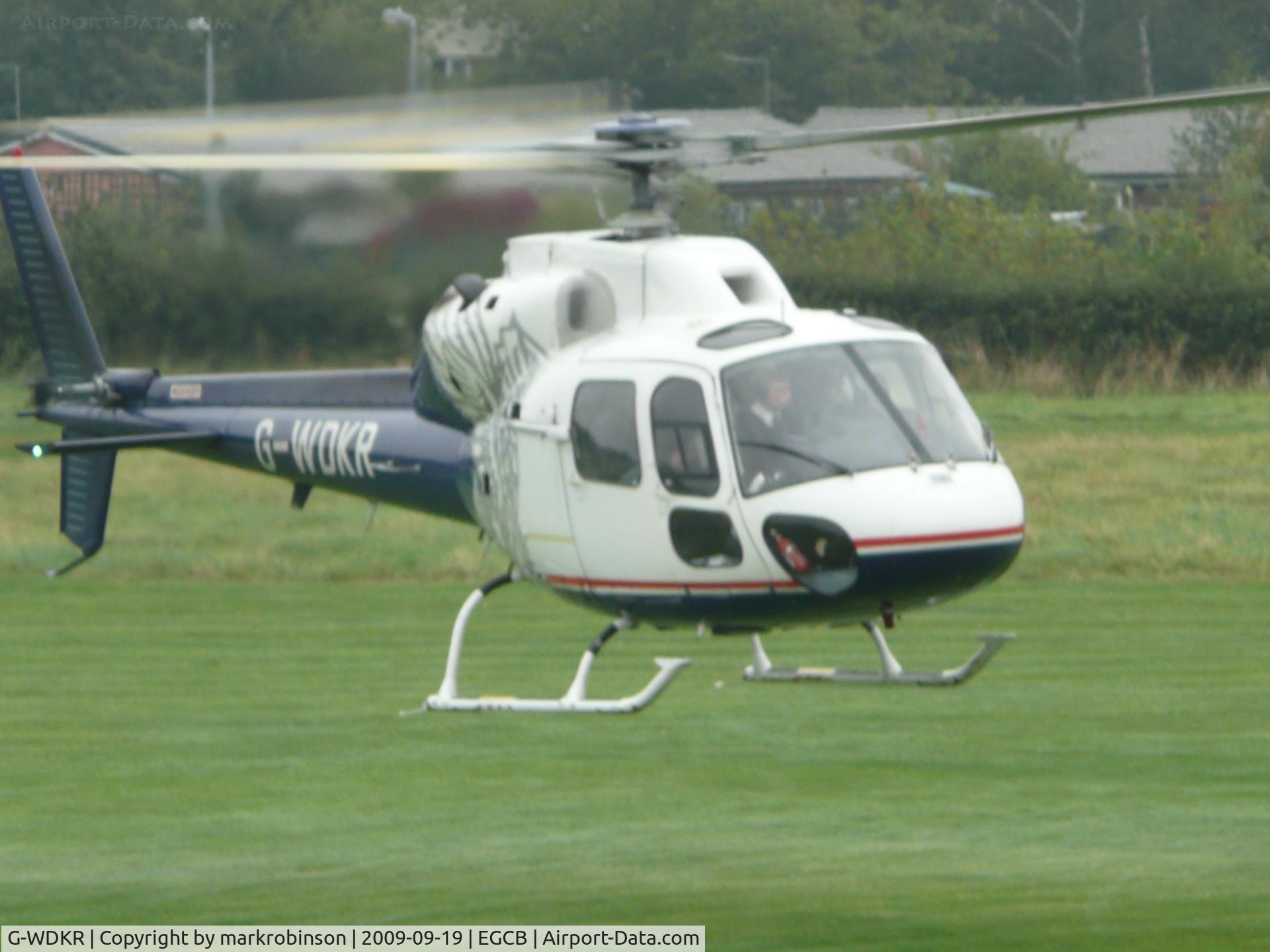 G-WDKR, 1981 Aerospatiale AS-355F-1 Ecureuil 2 C/N 5115, lifting off after takening on some JAT-A fuel.
