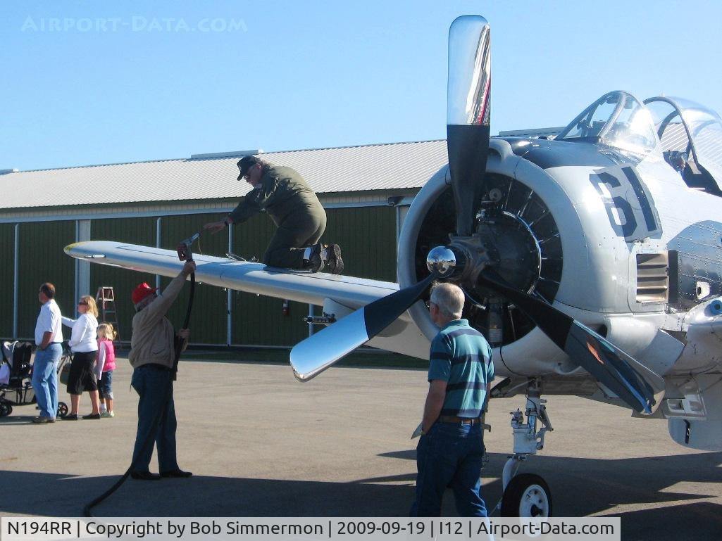 N194RR, North American T-28B Trojan C/N 200-265 (138194), Refueling at Sidney, Ohio during the EAA fly-in.