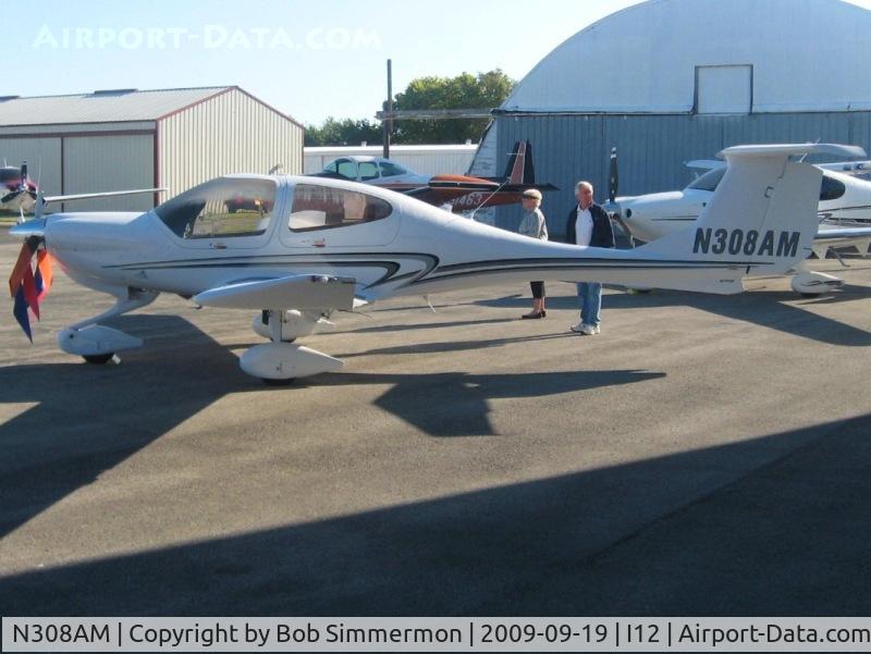 N308AM, 2008 Diamond DA-40 Diamond Star C/N 40.908, On the ramp at Sidney, Ohio during the EAA fly-in.