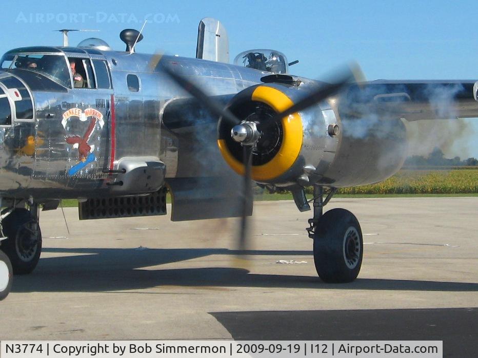N3774, 1943 North American B-25D Mitchell C/N 100-23960, No. 1 meshed on the ramp at Sidney, Ohio during the EAA fly-in.