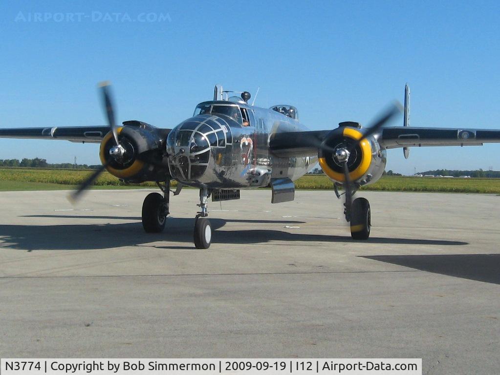 N3774, 1943 North American B-25D Mitchell C/N 100-23960, Warming up to depart with passengers for a short ride over western Ohio during the Sidney EAA fly-in.