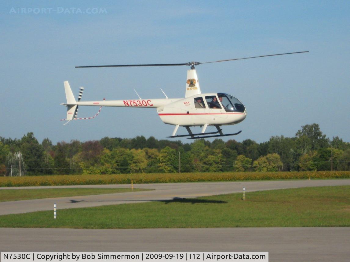 N7530C, 2004 Robinson R44 C/N 1398, Hauling rides during the EAA fly-in at Sidney, Ohio.