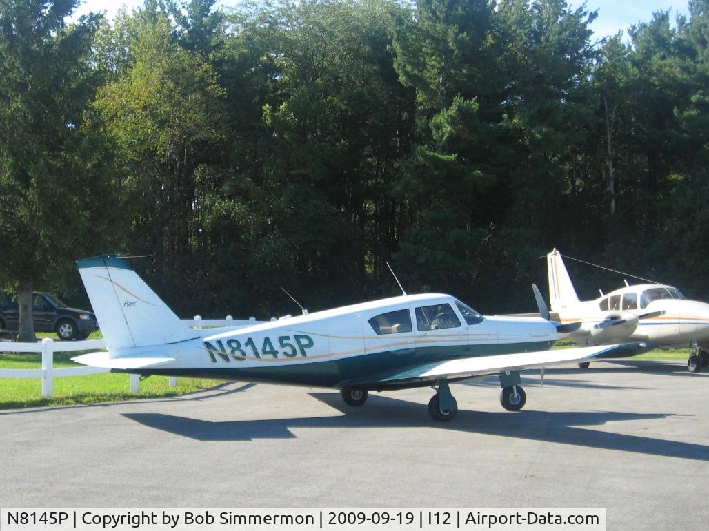 N8145P, 1963 Piper PA-24 Comanche C/N 24-3398, On the ramp at Sidney, Ohio during the EAA fly-in