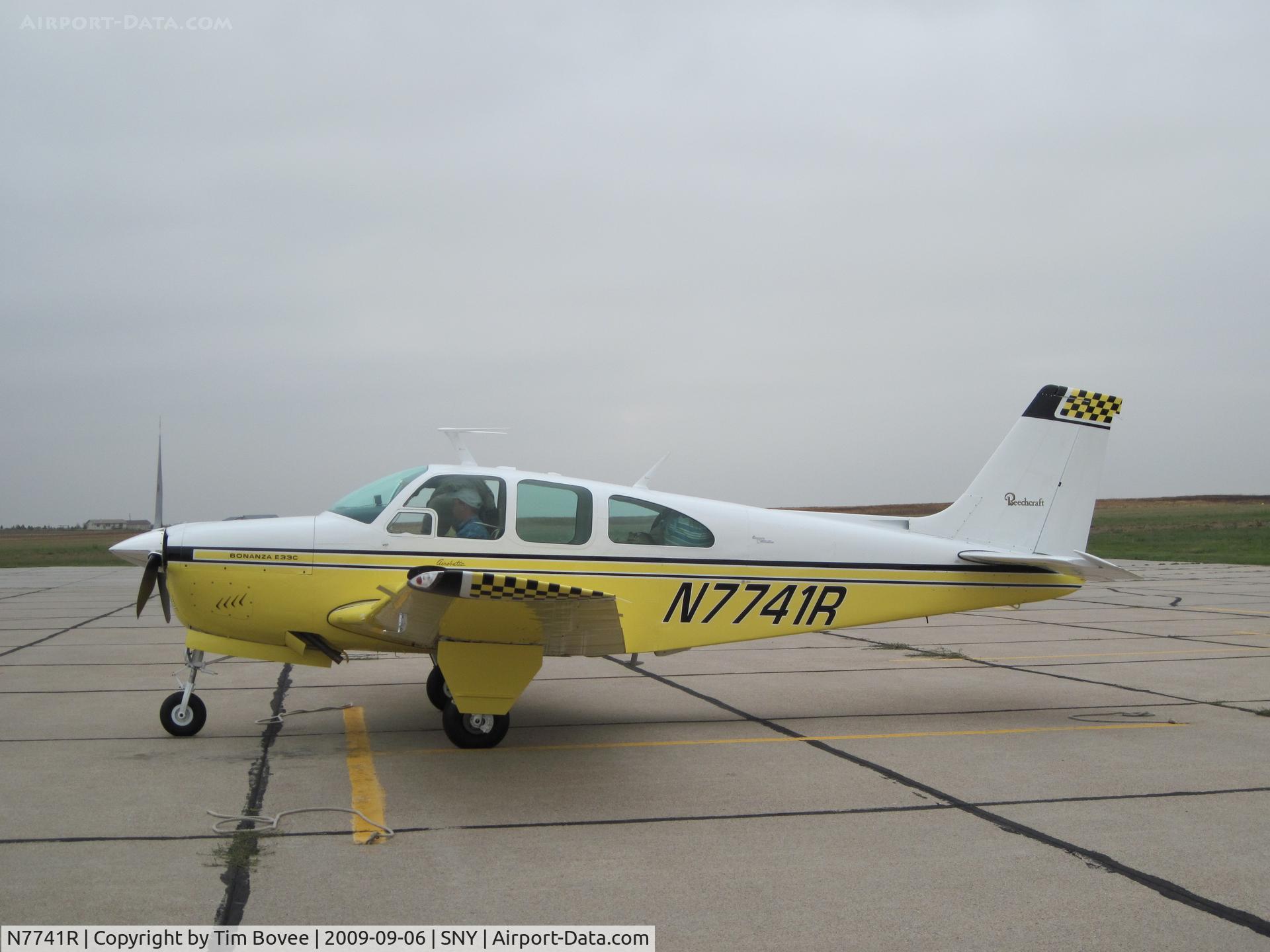 N7741R, Beech E33C Bonanza C/N CJ-10, Aerobatic Beach on the ramp at Sidney Nebraska sporting a new paint job and carrying new owners to points afar.
