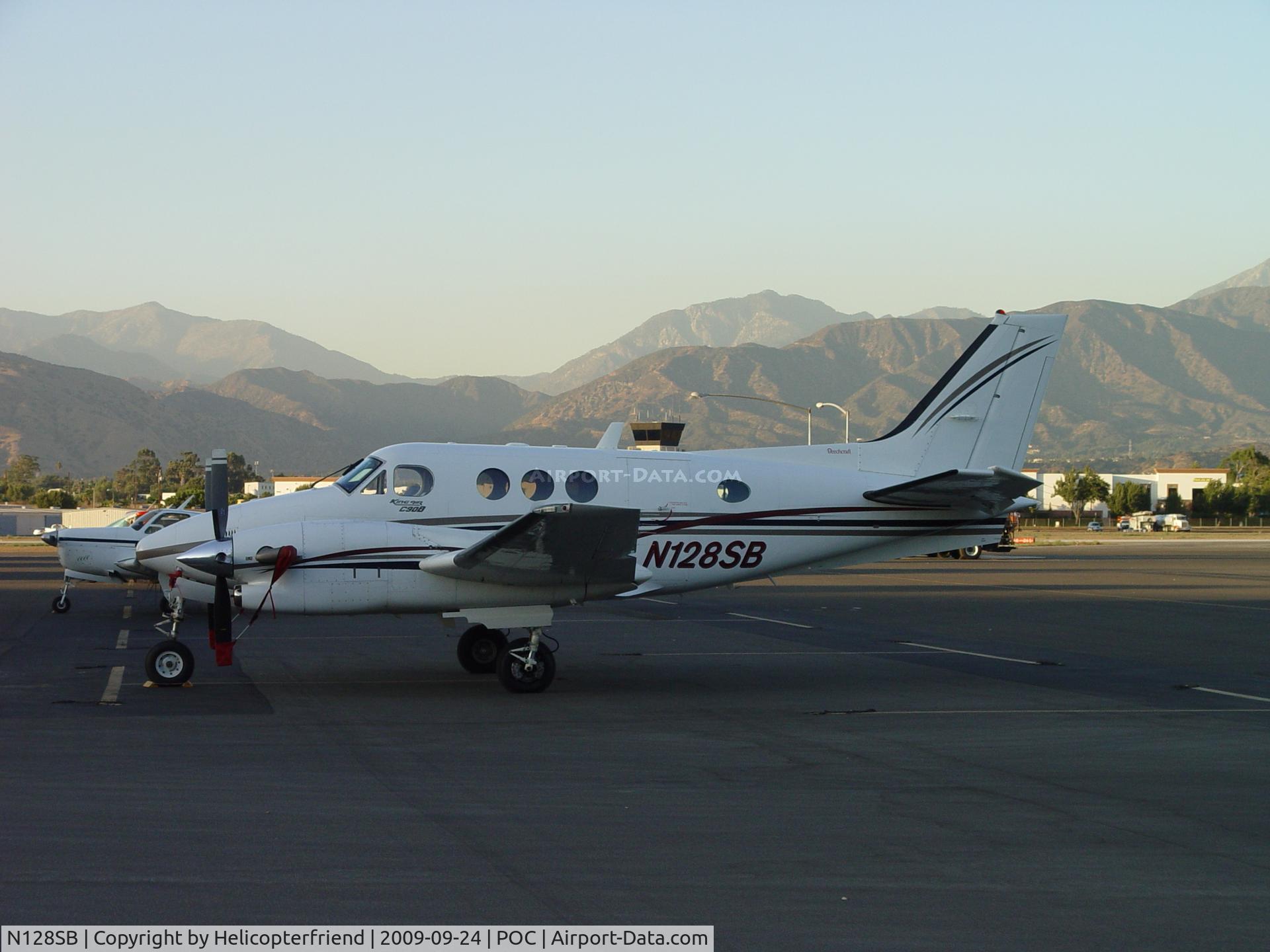 N128SB, 1997 Raytheon Aircraft Company C90A C/N LJ-1503, Parked and covered in Brackett transient Parking
