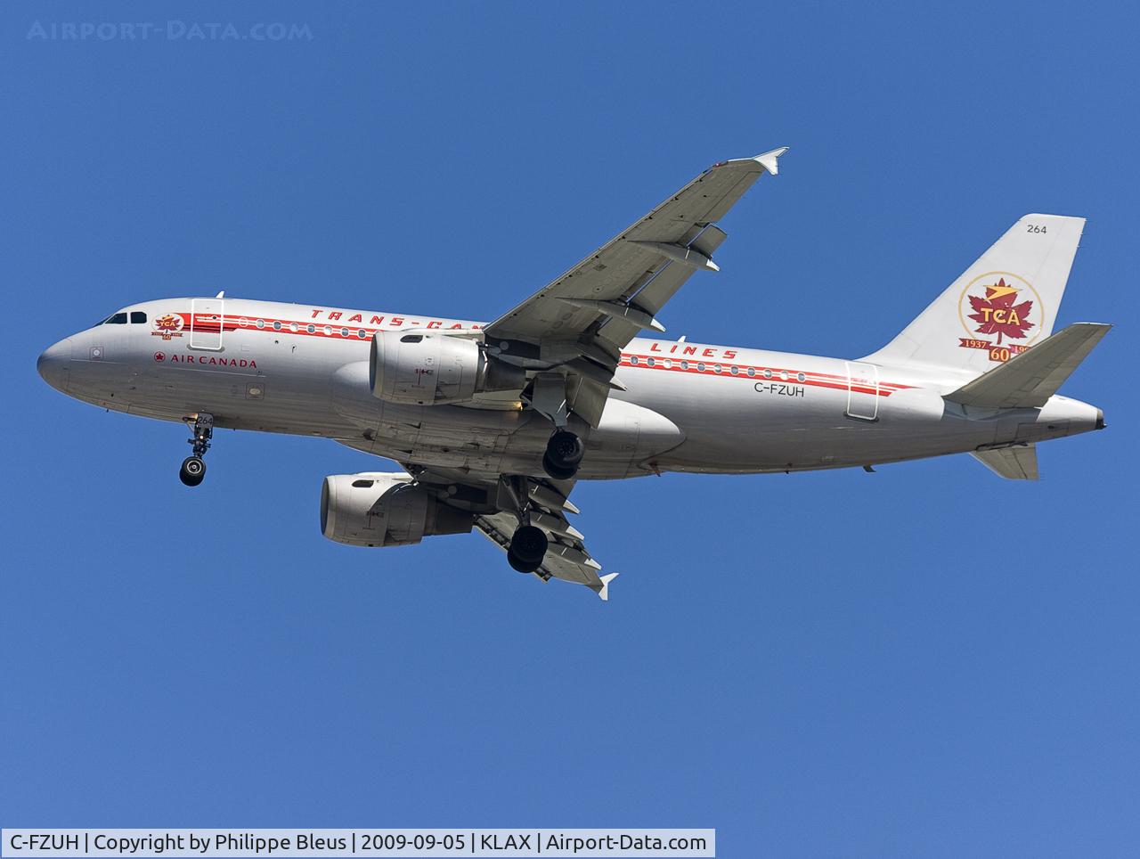 C-FZUH, 1997 Airbus A319-114 C/N 711, Old time type scheme plane on short final rwy 24R.