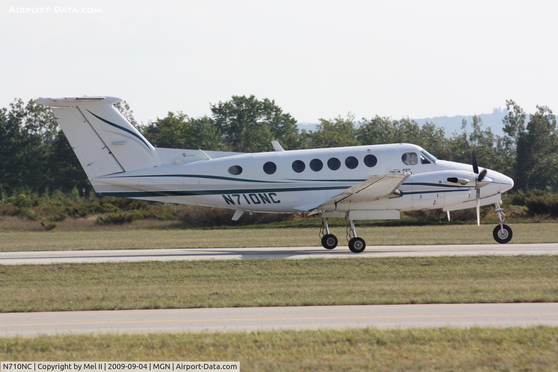 N710NC, 1977 Beech 200 C/N BB-322, Departing RWY 28