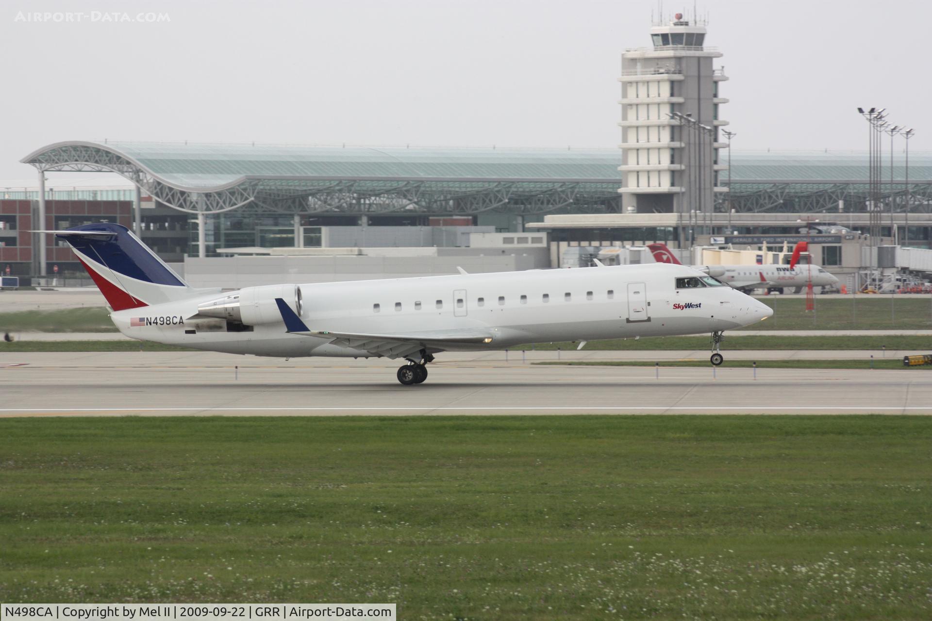 N498CA, 2003 Bombardier CRJ-200ER (CL-600-2B19) C/N 7792, SKW2589 - KGRR-KMKE - Departing RWY 8R