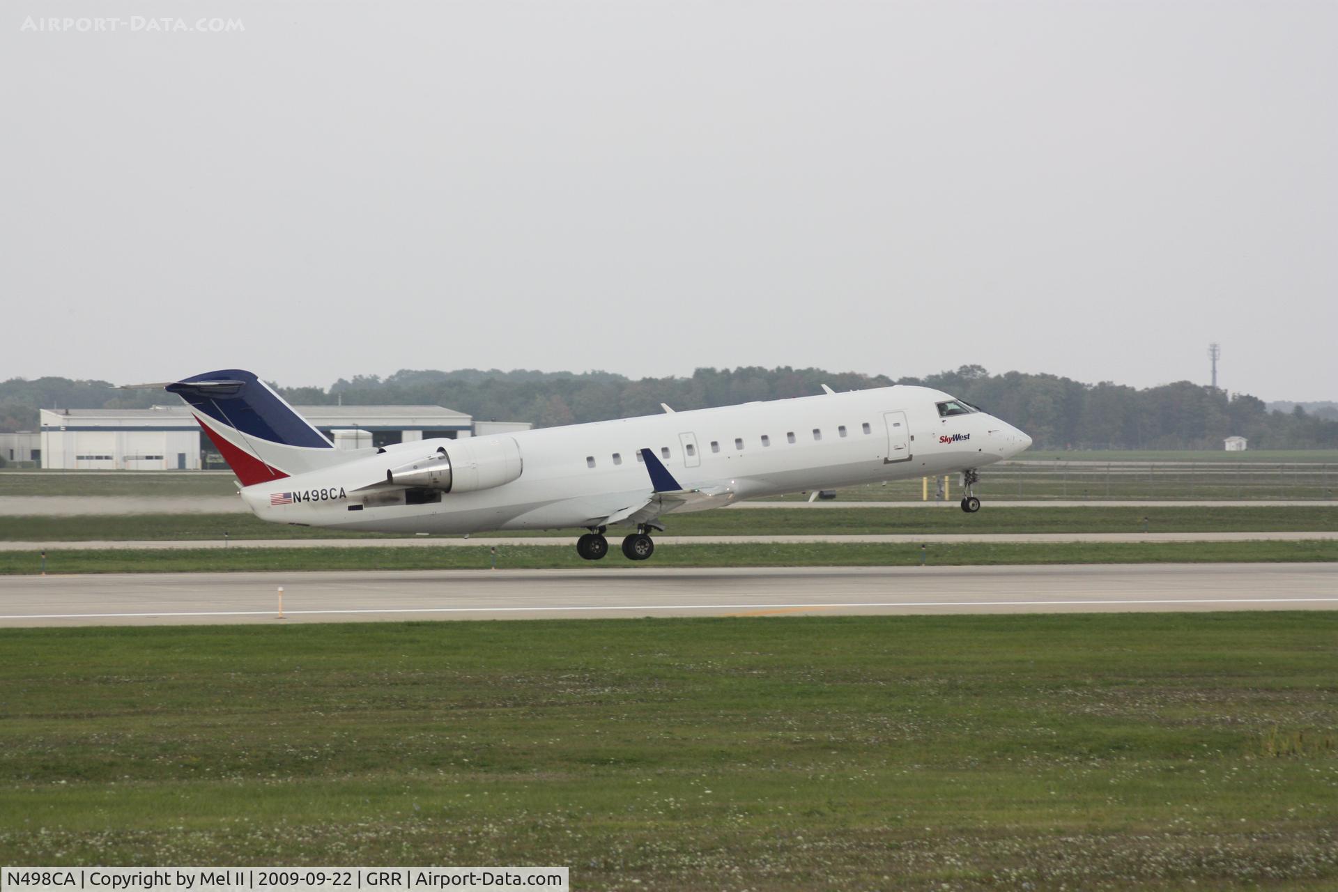 N498CA, 2003 Bombardier CRJ-200ER (CL-600-2B19) C/N 7792, BTA2105 - KGRR-KMKE - Departing RWY 8R