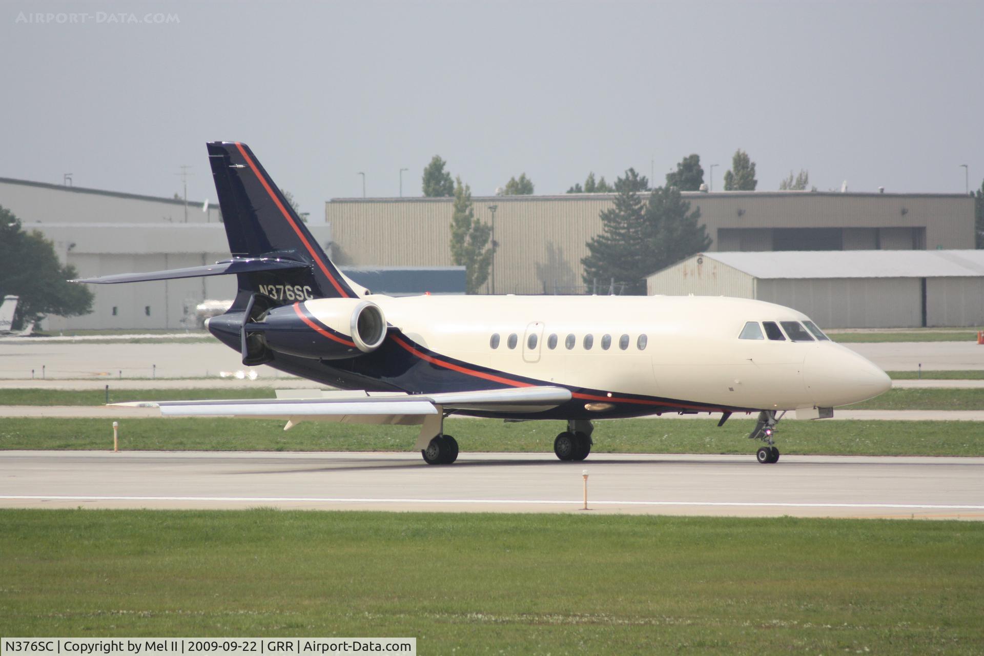 N376SC, 2005 Dassault Falcon 2000EX C/N 57, Landing RWY 8R