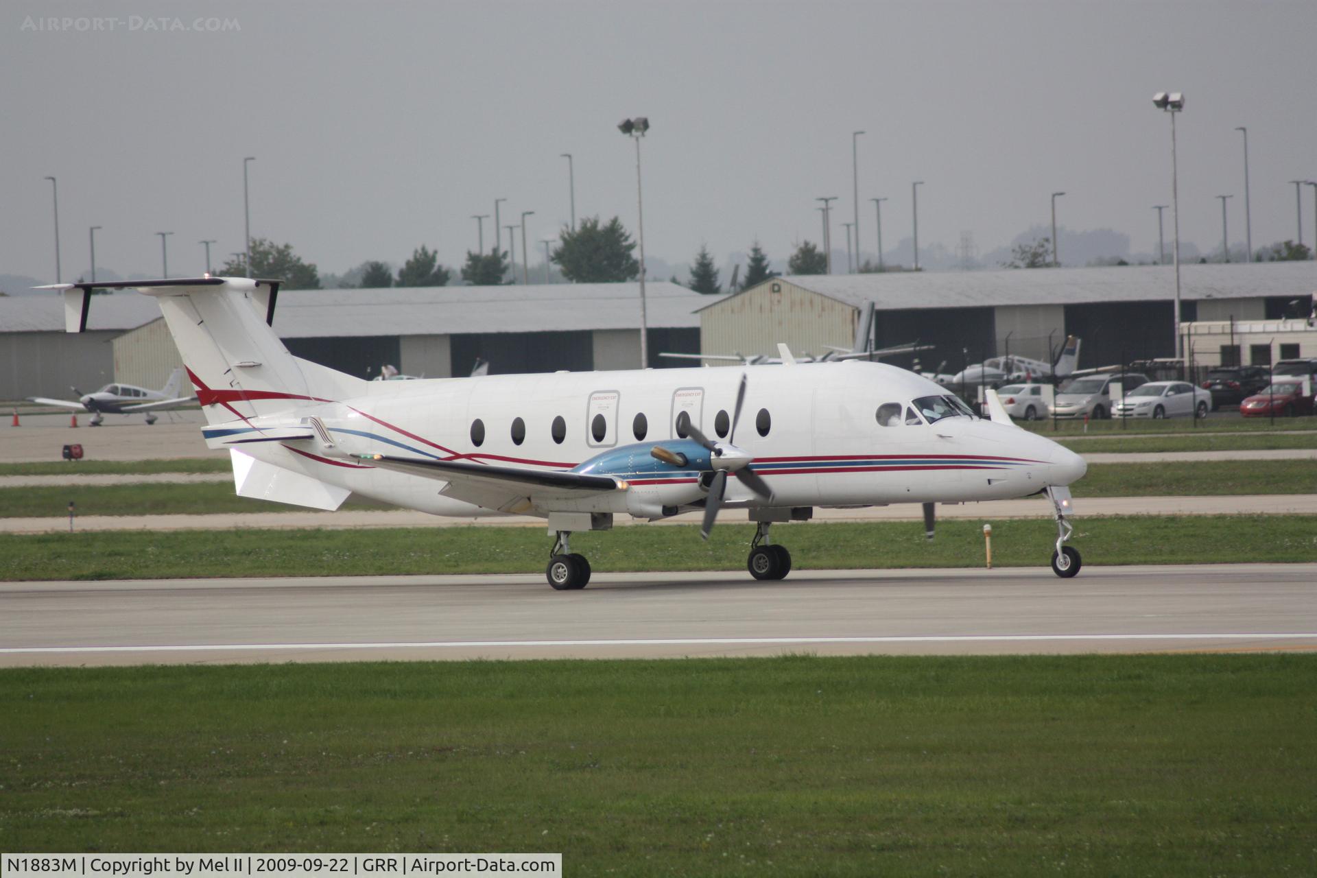 N1883M, 1999 Raytheon Aircraft Company 1900D C/N UE-354, KLUK-KGRR - Landing RWY 8R