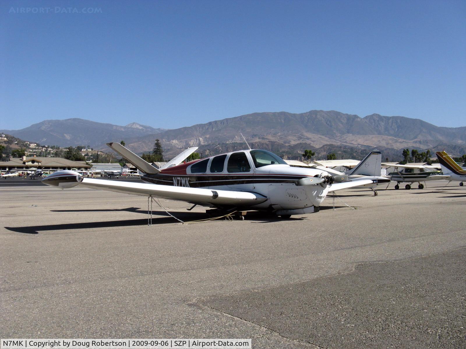 N7MK, 1951 Beech C35 Bonanza C/N D-3033, 1951 Beech C35 BONANZA, Continental E225 upgrade, 225 Hp for one minute @2,450 rpm, (c/n puts this as a 1952 build), prop bent back shows no power developed when landed gear not fully down