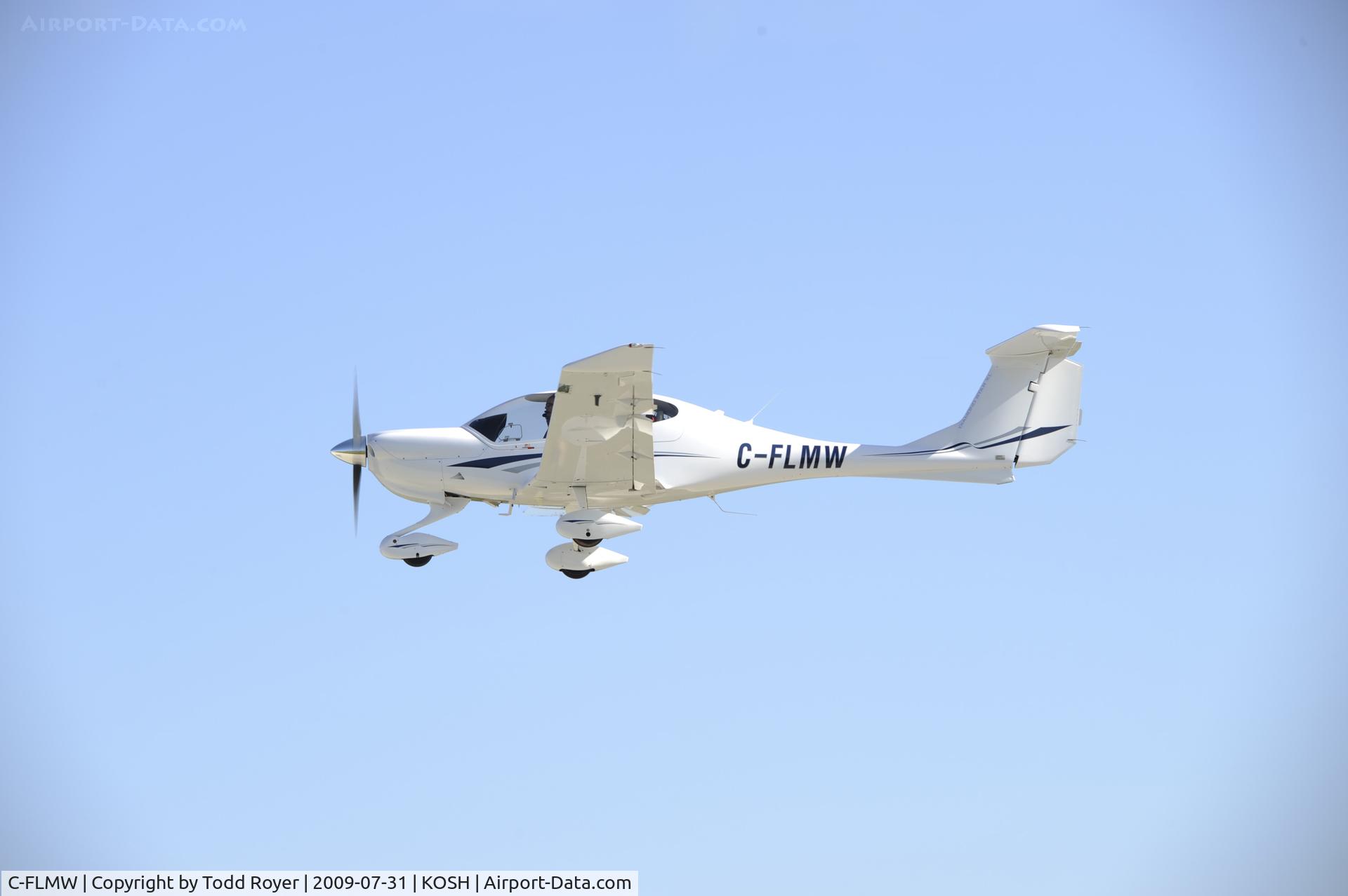 C-FLMW, 2005 Diamond DA-40 Diamond Star C/N 40.538, Departing OSH on 27