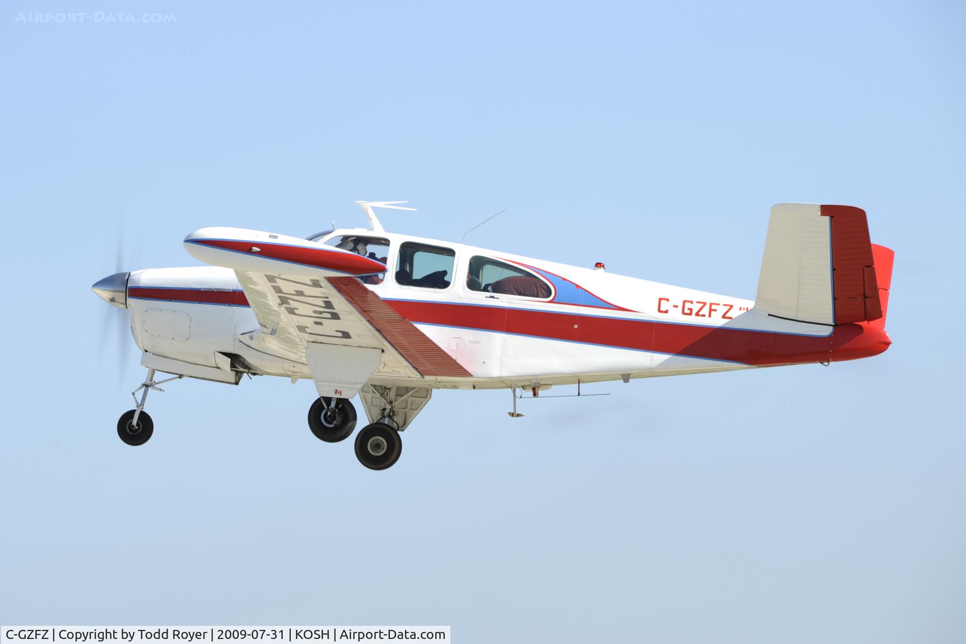 C-GZFZ, 1953 Beech D35 C/N D-3579, Departing OSH on 27