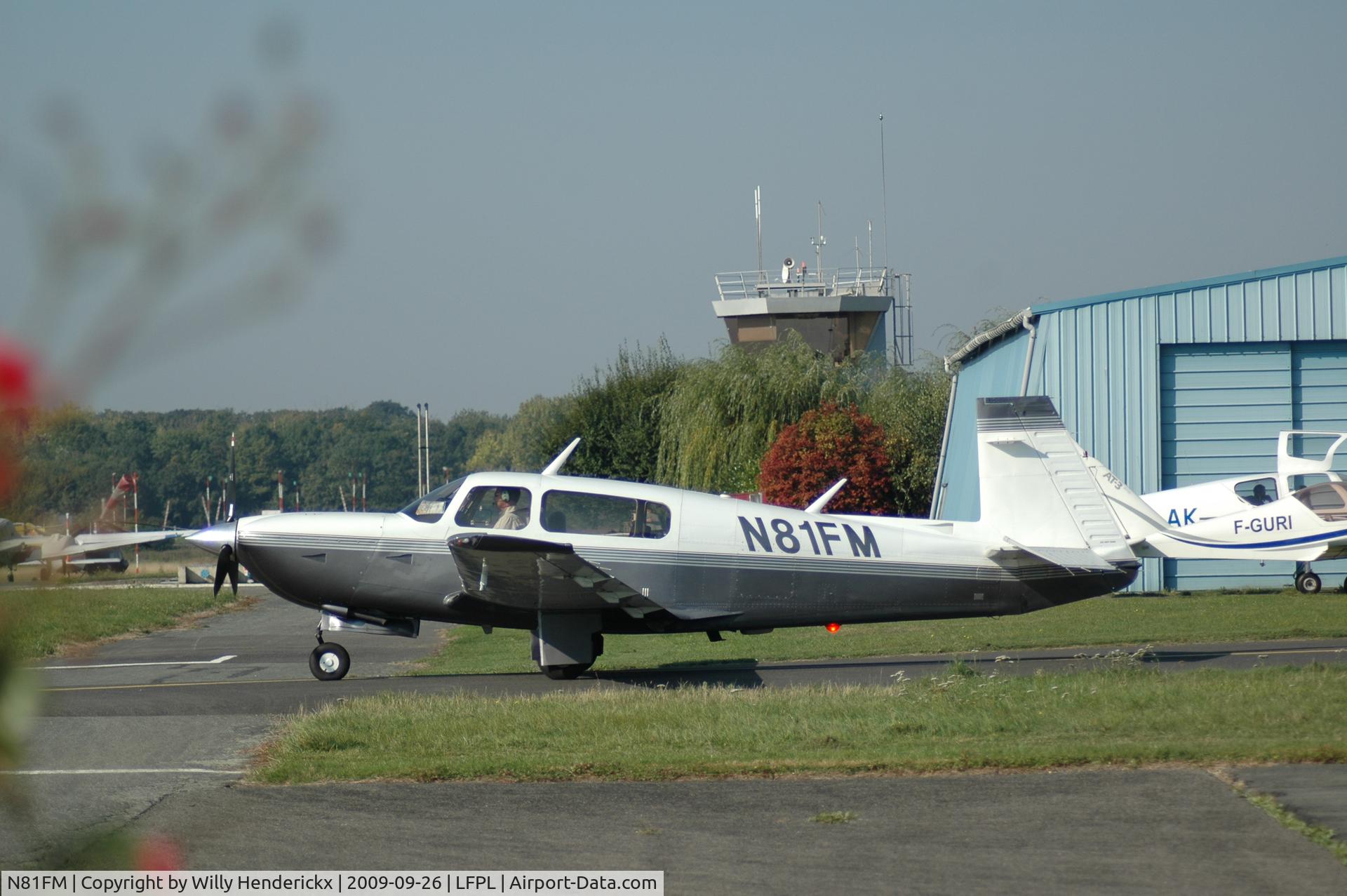 N81FM, 1999 Mooney M20R Ovation C/N 29-0180, Leaving parking area for active runway