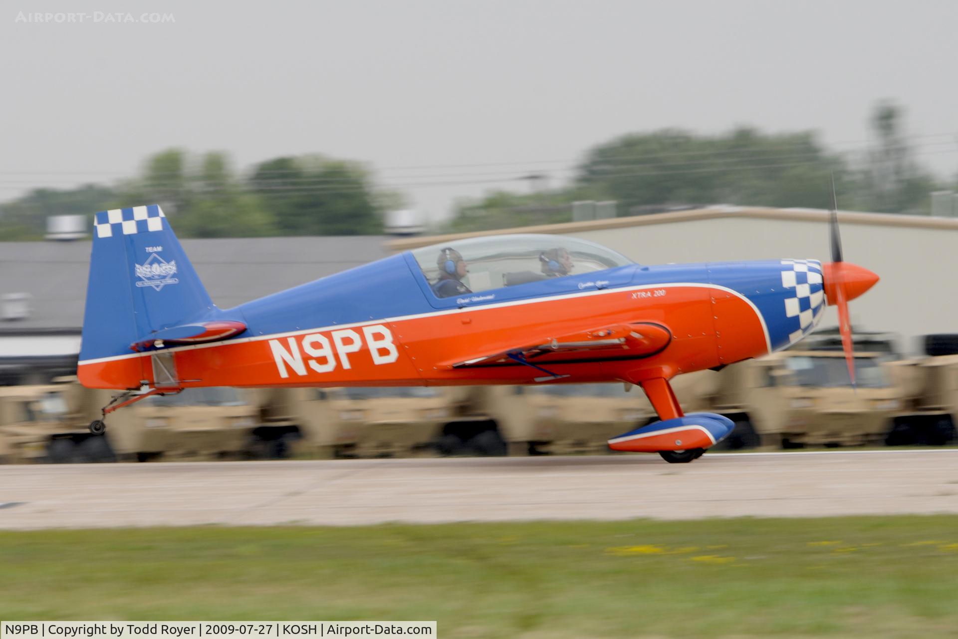 N9PB, 1998 Extra EA-300/200 C/N 026, Departing OSH on 18