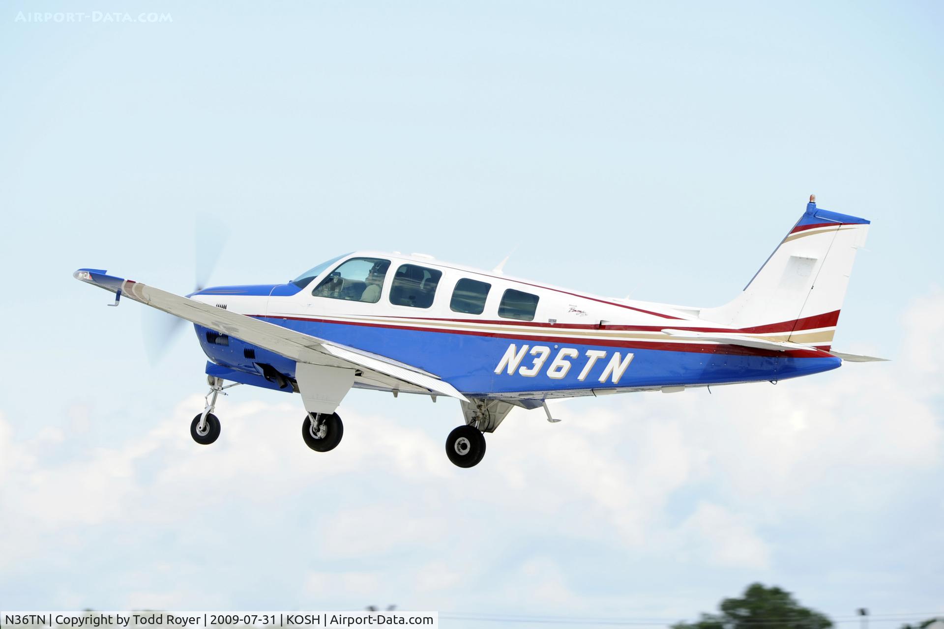 N36TN, 1984 Beech B36TC Bonanza C/N EA-403, Departing OSH on 27