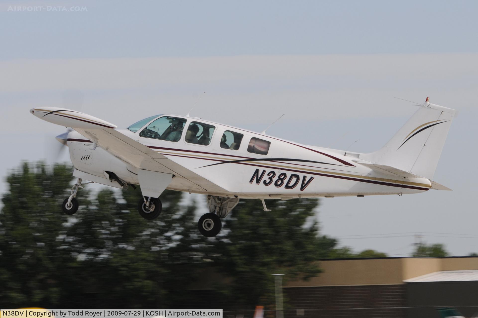N38DV, 1968 Beech 36 Bonanza C/N E-83, Departing OSH on 27