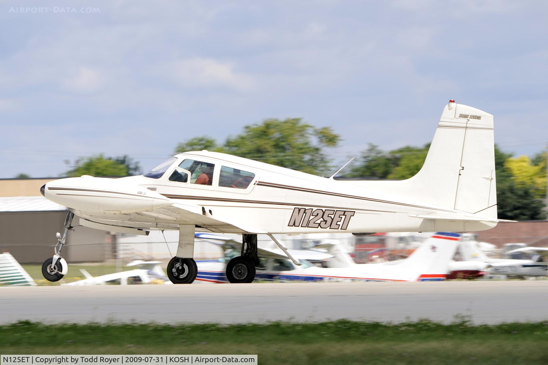 N125ET, 1958 Cessna 310B C/N 35706, Departing OSH on 27