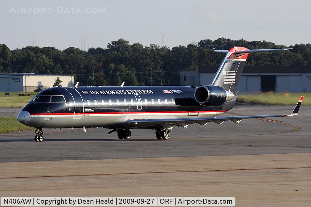 N406AW, 2000 Bombardier CRJ-200LR (CL-600-2B19) C/N 7402, US Airways Express (Air Wisconsin) N406AW (FLT AWI4071) taxiing to RWY 23 for departure to Reagan National (KDCA).