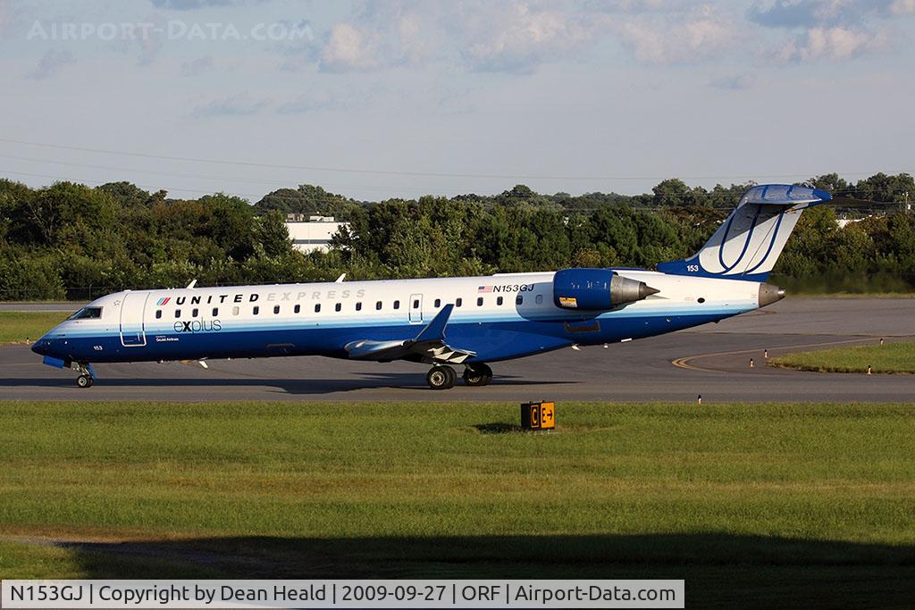 N153GJ, 2005 Bombardier CRJ-702 (CL-600-2C10) Regional Jet C/N 10219, United Express (Go Jet Airlines) N153GJ (FLT GJS7410) taxiing to RWY 23 for departure to Washington Dulles Int'l (KIAD).