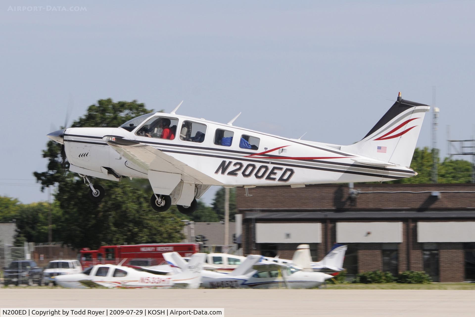 N200ED, 1977 Beech A36 Bonanza 36 C/N E-957, Departing OSH on 27